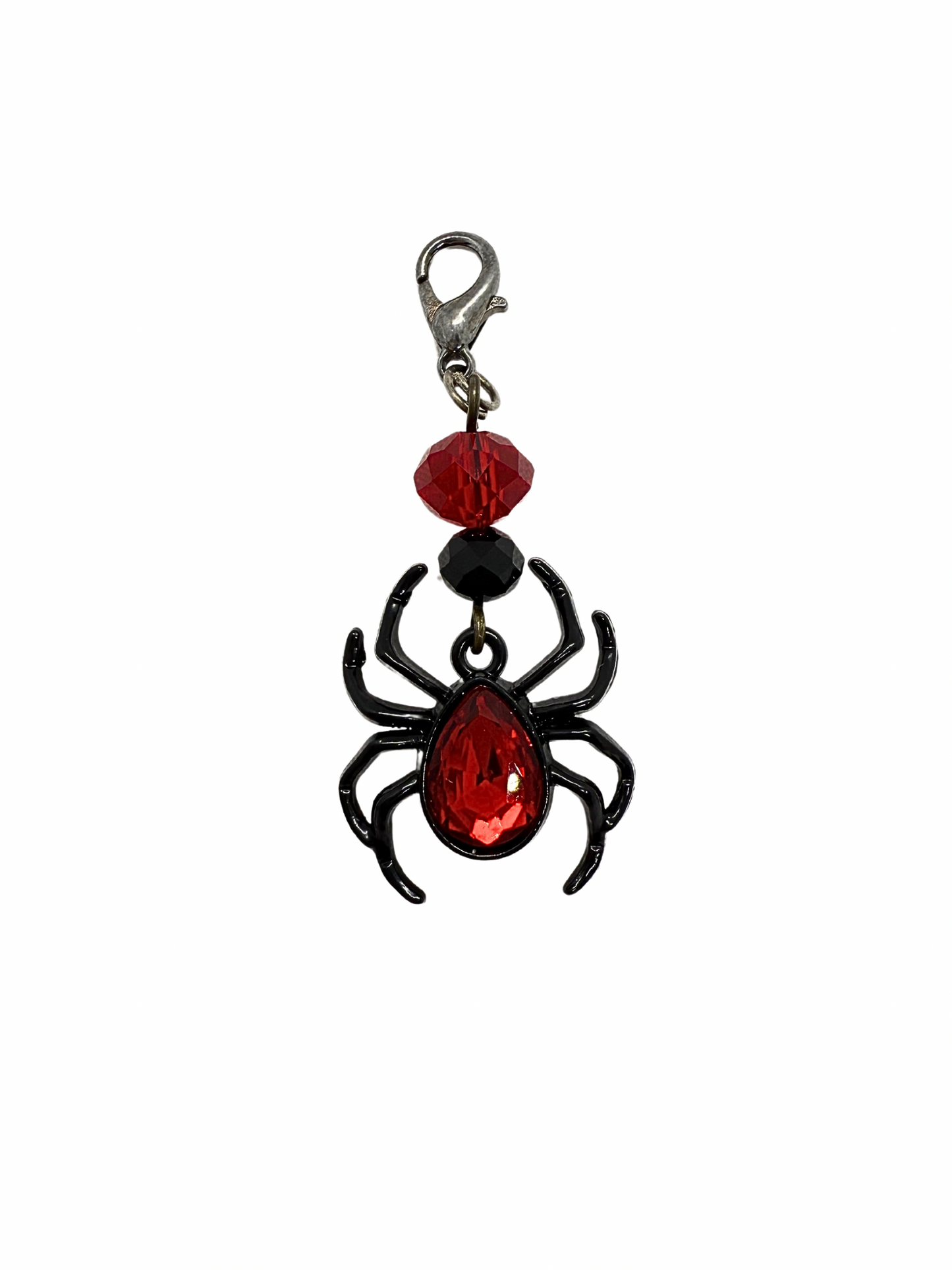 Metaliniai pakabukai: „Spiderman“, „Hello Kitty“ ir gyvatės