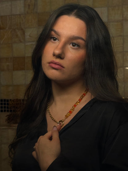 “Orange splash” grandinėlė